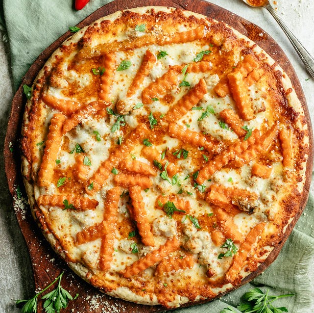 Golden roasted potatoes on pizza